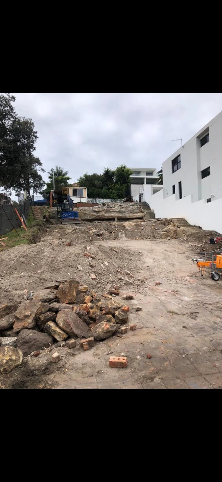 Excavator operating on an excavation site