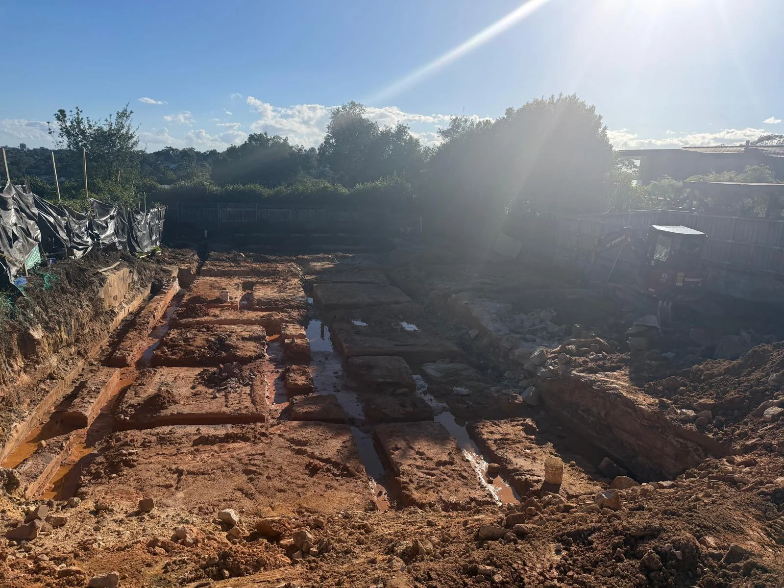 Machinery preparing a construction site